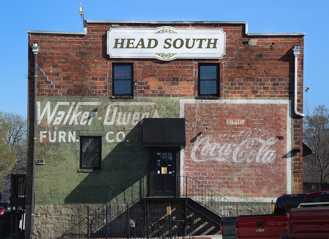 About Our Agency - HeadSouth Insurance Office With Vintage Brick Exterior